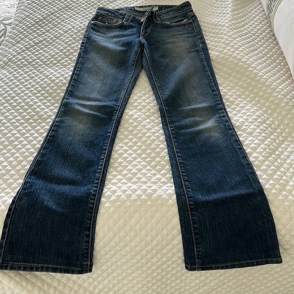 Joes Jeans flare bottom low rise dark rinse denim back left rear small patch